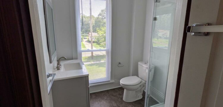white bathroom with large window