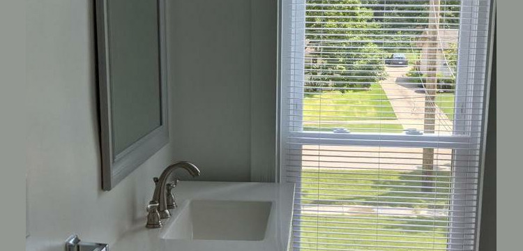 bathroom sink and large window